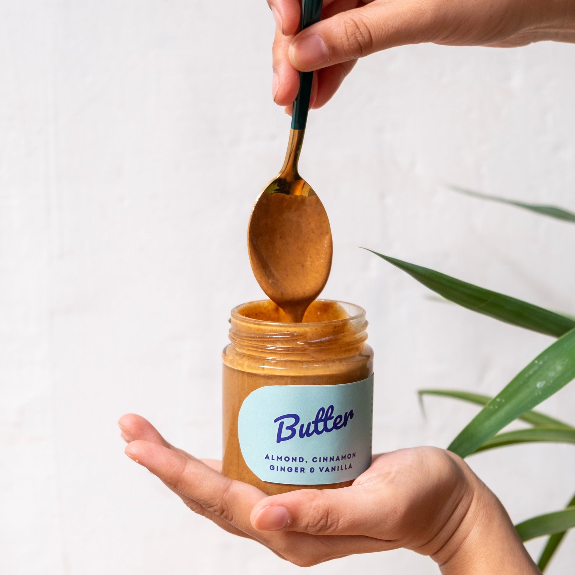 almond butter with a spoon drizzling