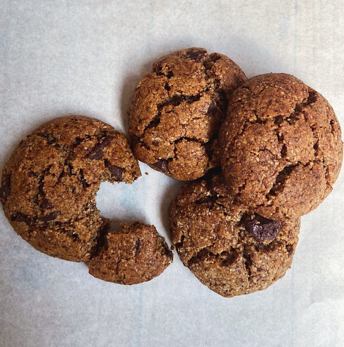 healthy gluten free vegan almond chocolate cookies on a white background