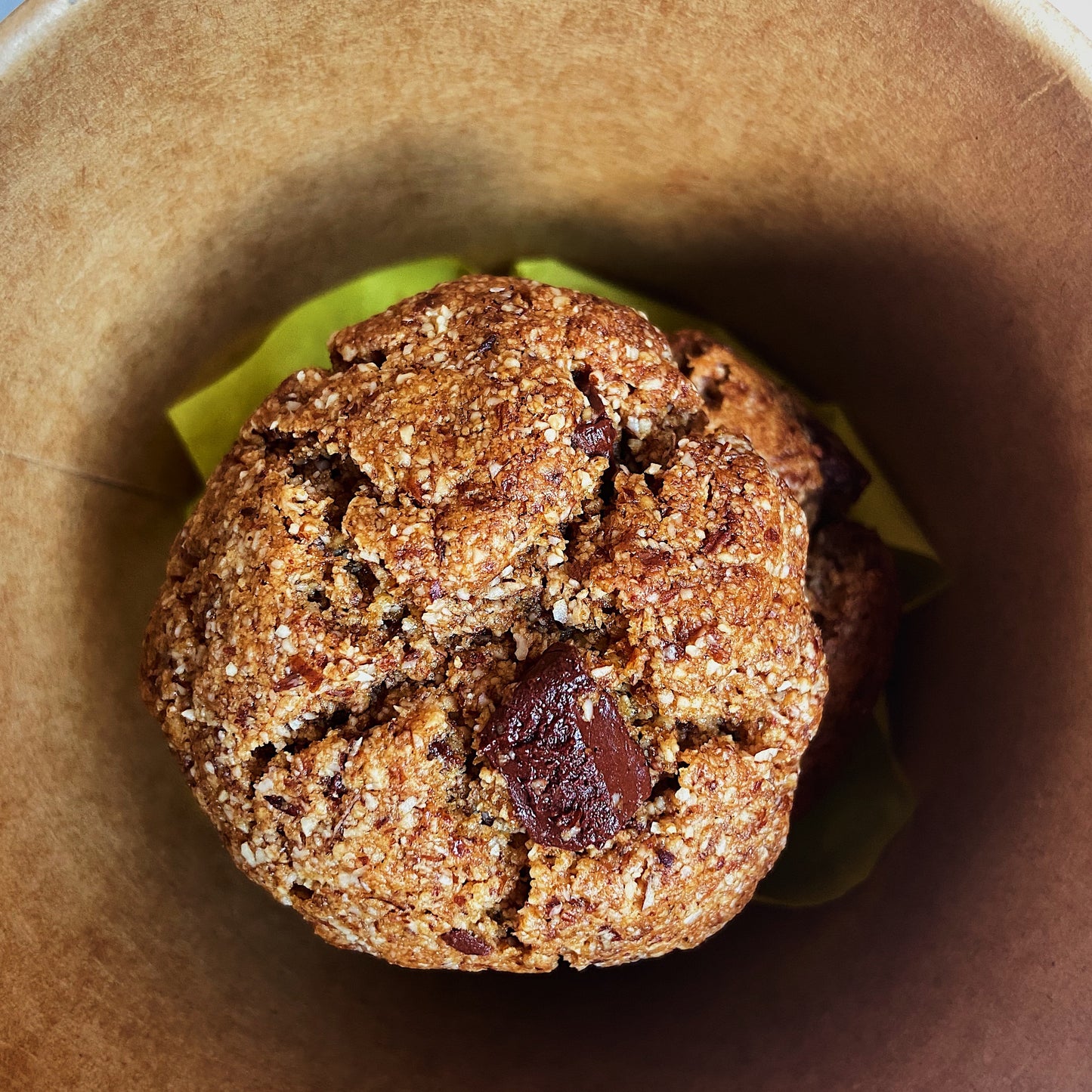 healthy gluten free vegan almond chocolate cookies in a brown box