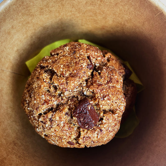 healthy gluten free vegan almond chocolate cookies in a brown box